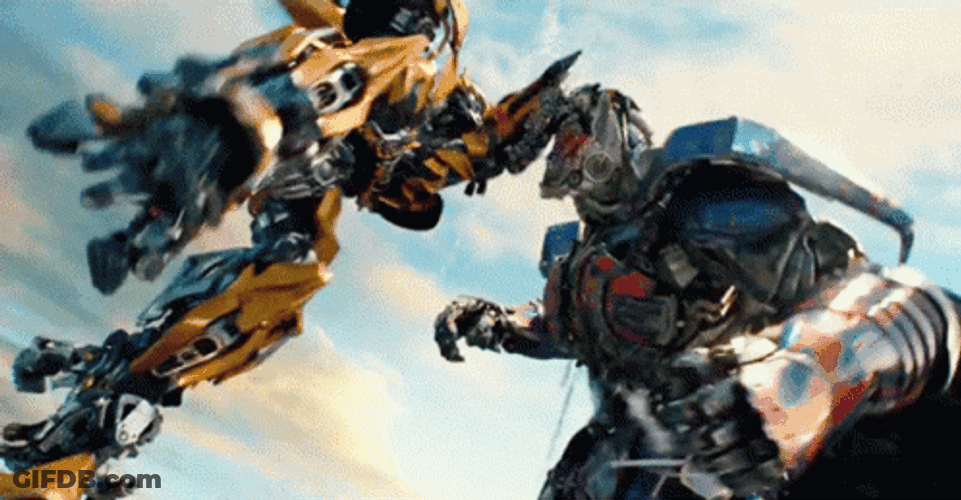 Optimus Prime Fighting Bumblebee GIF
