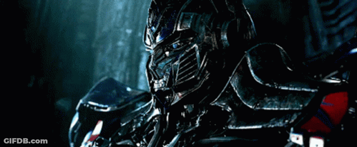 Optimus Prime Foe Megatron Facing Forward GIF