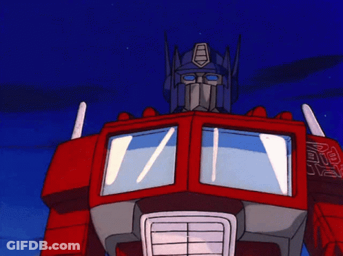 Optimus Prime Holding Up Arrow GIF