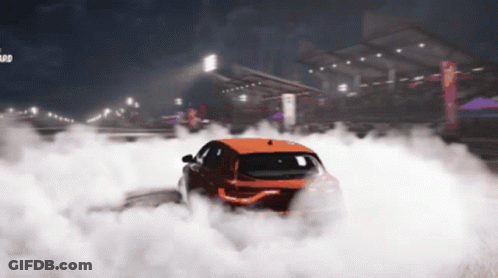 Orange Car Doing Burnout Beside Hazard Sign GIF