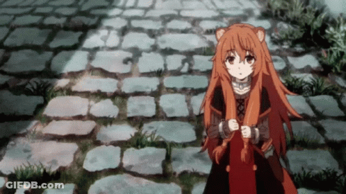 Orange-Haired Girl Holding Scarf On Stone Path GIF