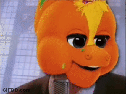 Orange Head Cartoon Talking Into Microphone GIF