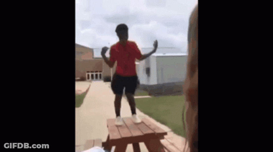 Orange Justice Dance On Top Of Table GIF