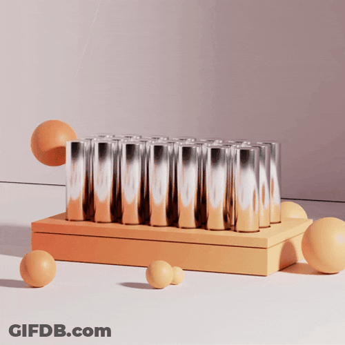 Orange Pendulum Swaying Above Tubes GIF