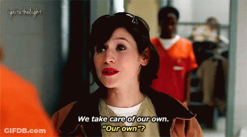 Orange Shirt Woman Says We Take Care GIF