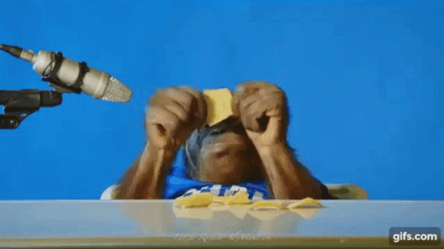 Orangutan Munching On Chips GIF