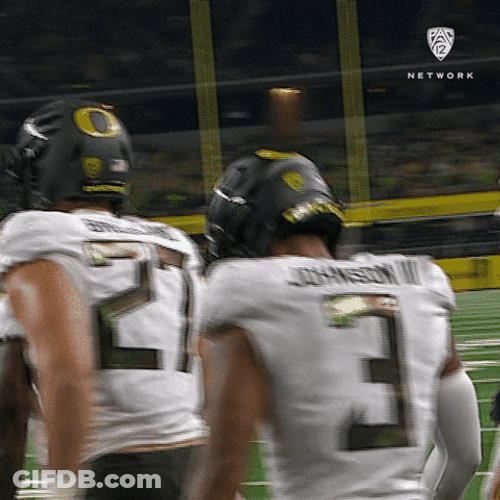 Oregon Ducks Football Team Assisted Jump GIF