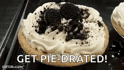 Oreo Pie With Whipped Cream And Oreos On Tray GIF