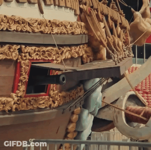 Ornate Ship With Red Window And Cannon GIF