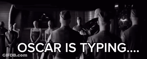 Oscar Is Typing Written On Black And White Image GIF