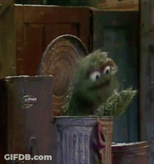 Oscar The Grouch Speaking From The Trashcan GIF