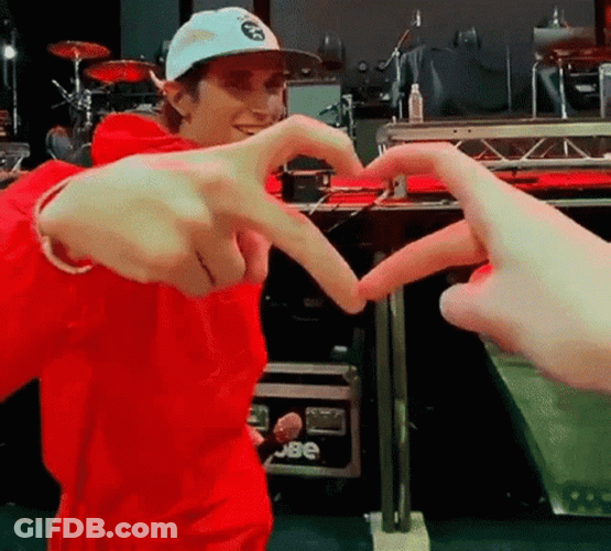 Otto Wood Heart Hands GIF