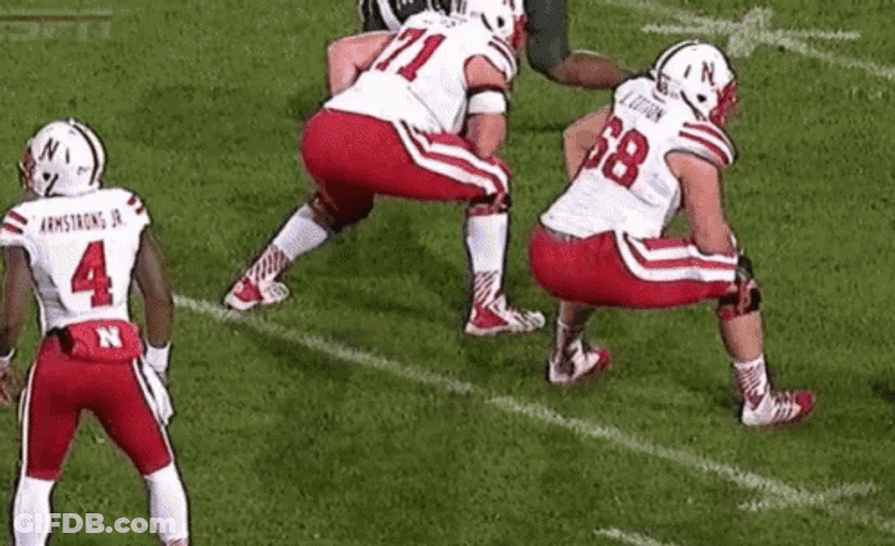 Out Of Balanced Huskers Football Player GIF