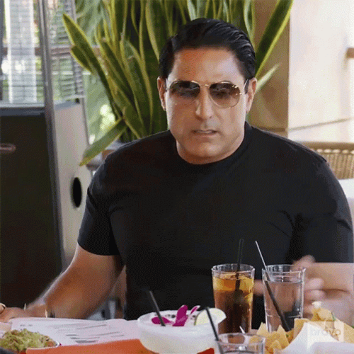 Outraged Man Tossing Drink GIF