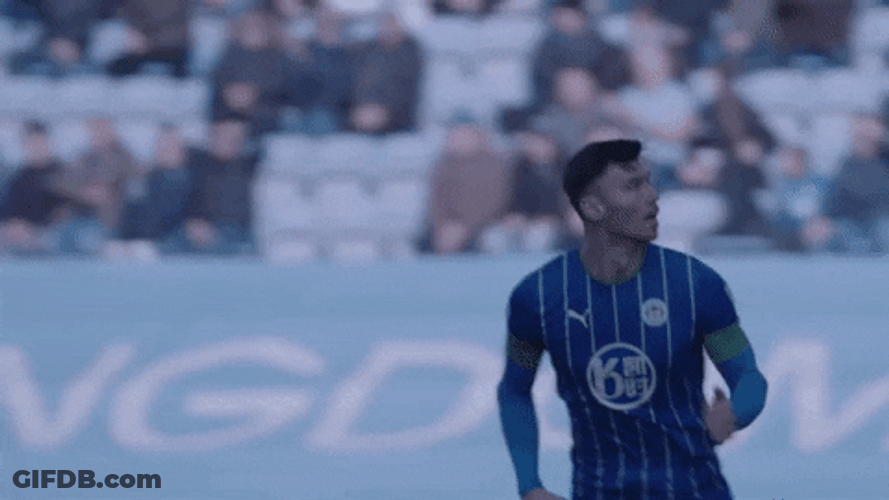 Over Your Head Football GIF