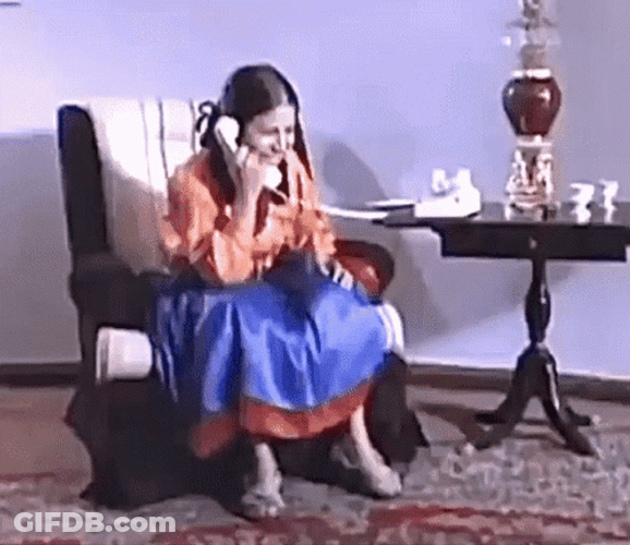 Overjoyed Girl Answering Phone Call GIF