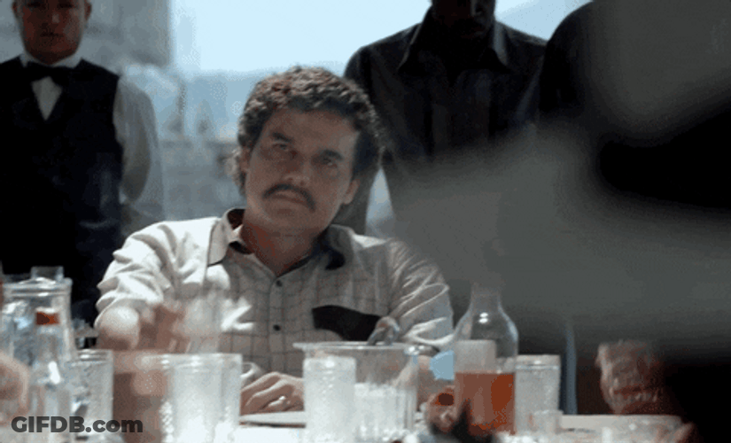 Pablo Escobar Raising Drink GIF