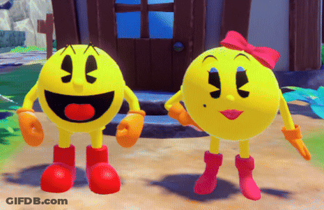 Pac Man And Pac Woman Are Holding Hands In A Video Game GIF