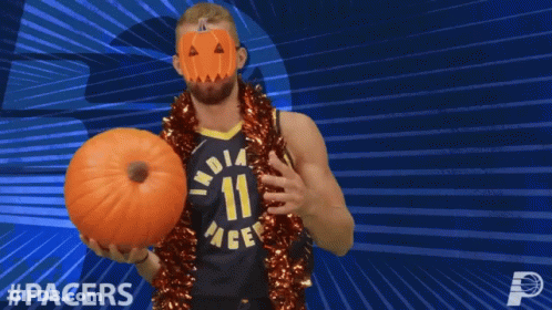 Pacers Player With Pumpkin In Front Of Face GIF