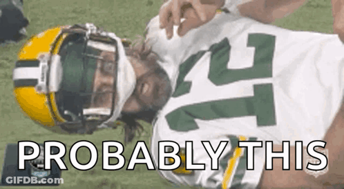 Packers Player Laying On Field Saying Probably This GIF