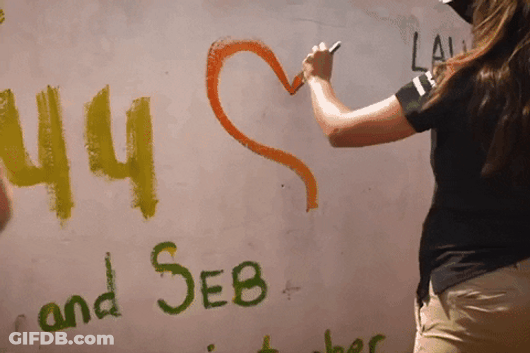 Painting Big Heart On A Wall GIF