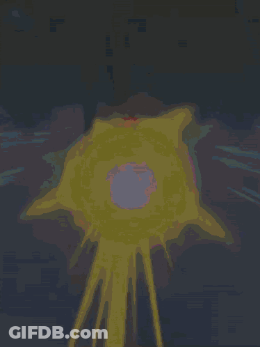 Painting Of Yellow Object With White Center GIF