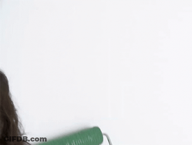 Painting The Wall Green GIF