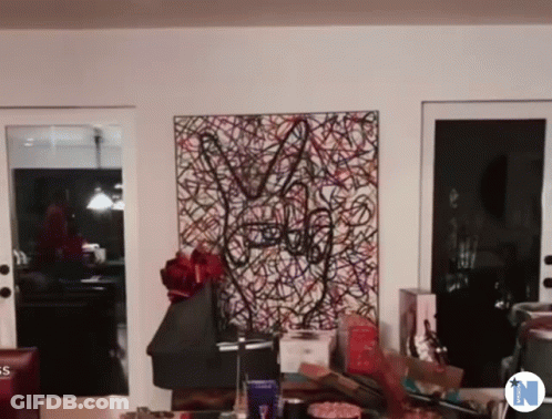 Painting With Letter N On Bottom GIF