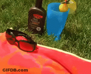 Palmer's Dark Tanning Oil Bottle GIF