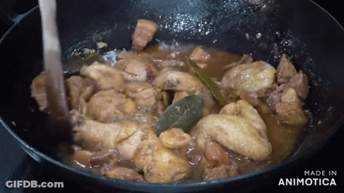 Pan Of Chicken Stirred With Wooden Spoon Made In Animotica GIF