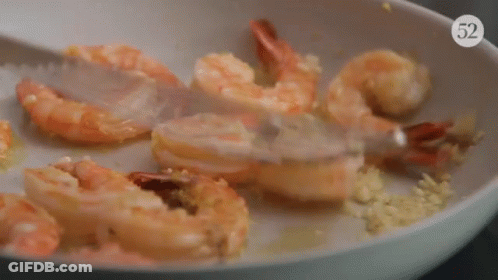 Pan Of Shrimp Stirred With Fork Number 52 GIF
