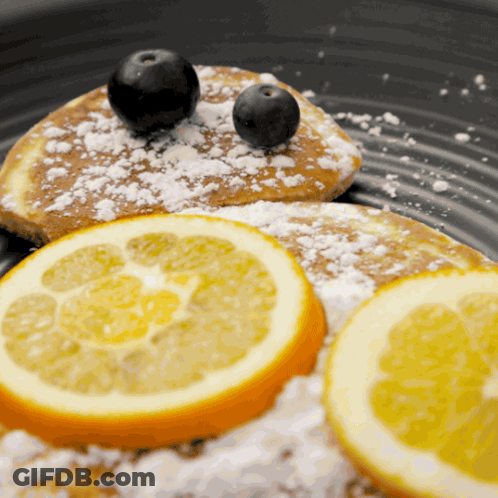 Pancakes With Blueberries And Lemon Slices GIF