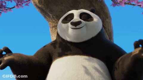 Panda Bear Sitting In Front Of Tree GIF