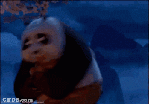 Panda Bear Standing In Front Of Tree With Flowers GIF