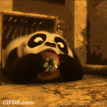Panda Lying On Ground Eating Donut GIF