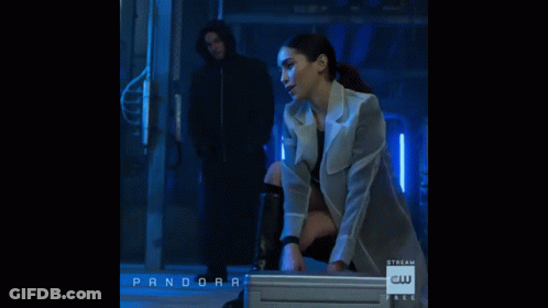 Pandora Advertisement Man And Woman In Dark Room GIF
