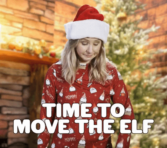 Papa Elf Girl Wears Santa's Hat GIF