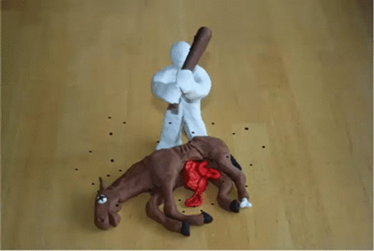 Paper Man Beating A Dead Horse GIF