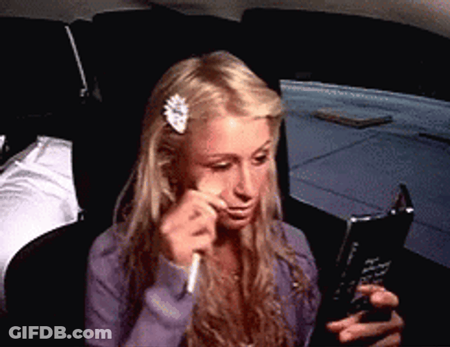 Paris Hilton Doing Her Makeup GIF