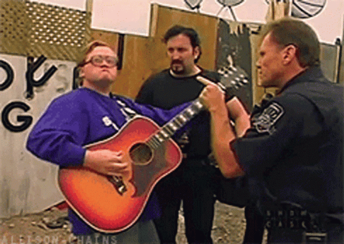 Park Boys Playing Guitar On Street GIF