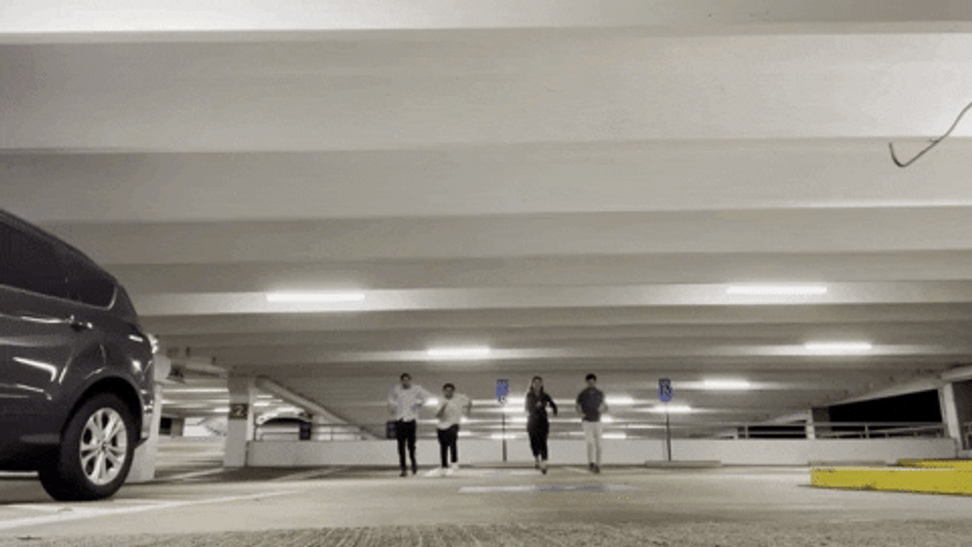 Parking Lot Four Man Speed Walking GIF