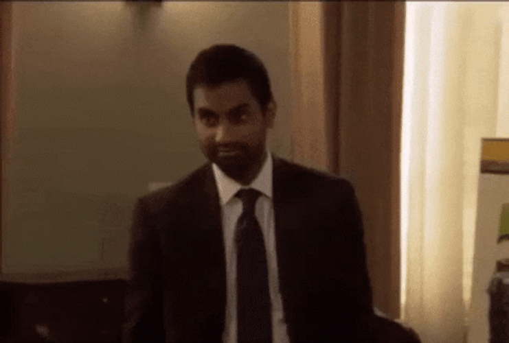 Parks And Rec Aziz Ansari Funny Smile GIF