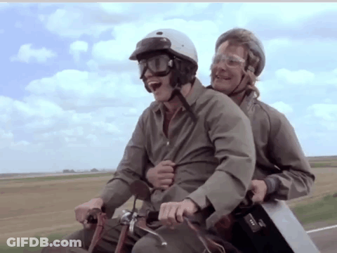 Passenger In Helmet And Goggles On Motorcycle GIF