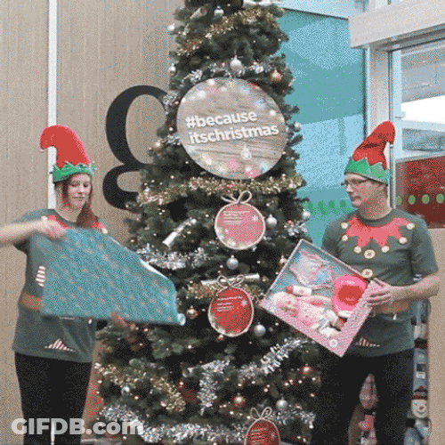 Passing Christmas Gift GIF