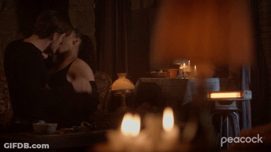 Passionate Kissing By Candle Light GIF