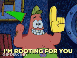 Patrick Star From Spongebob Is Holding A Green Flag And A Yellow Finger GIF