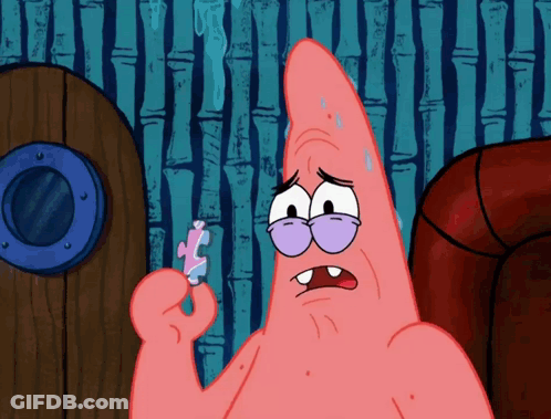 Patrick Star From Spongebob Is Holding A Piece Of Puzzle GIF