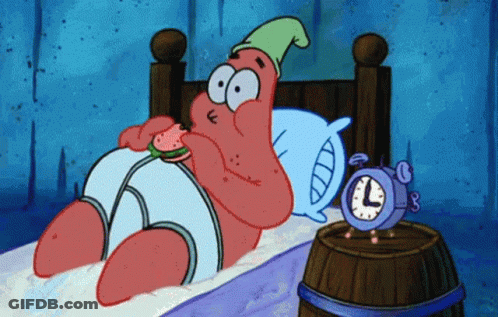 Patrick Star From Spongebob Is Laying In Bed Eating A Watermelon GIF