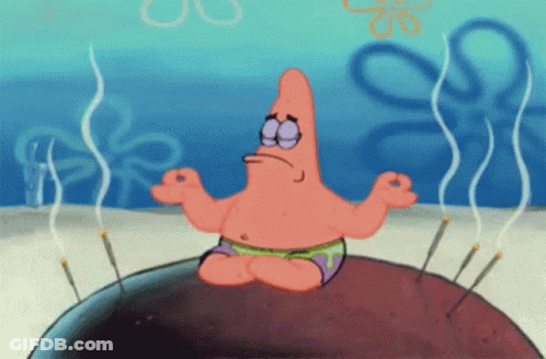 Patrick Star From Spongebob Is Meditating On A Rock With Needles GIF