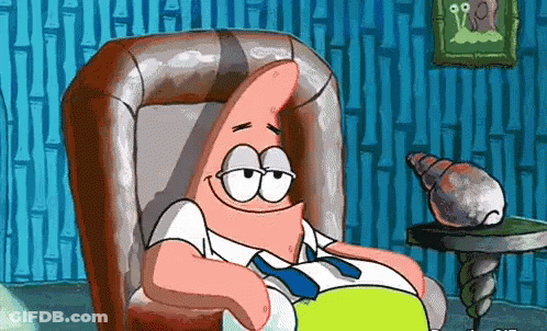 Patrick Star From Spongebob Is Sitting In A Chair With His Eyes Closed GIF